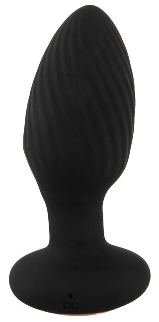 ANOS RC Roterande Buttplug är en svart silikonplugg med en räfflad, droppform, cirkulär bas och anpassningsbar njutning genom flera vibrationslägen.