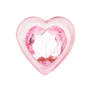 Heart Shaped Glass Buttplug 7 cm har en glänsande rosa hjärtformad pärla i en klar hjärtformad bas mot en vit bakgrund, vilket ger en delikat och elegant glasdesign som är perfekt för temperaturlek.