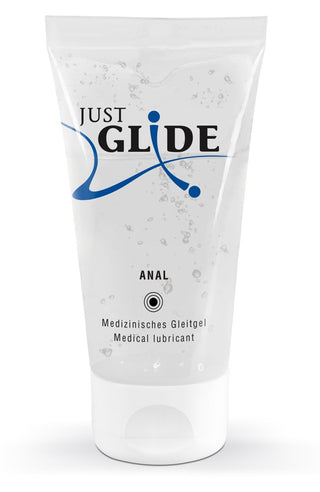 Tube of Just Glide Anal Glidmedel med blå grafik på vit bakgrund.