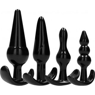 Analträning Ankar Buttplug 4-pack erbjuder svarta buttplugs i olika former och storlekar med utsvängda baser, perfekta för både nybörjare och erfarna användare.