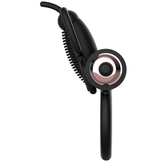 Närbild av en modern Bluetooth-hörlur i svart och roséguld, utstrålar elegans jämförbar med Coquette Chick Desire Penisring, mot en vit bakgrund.