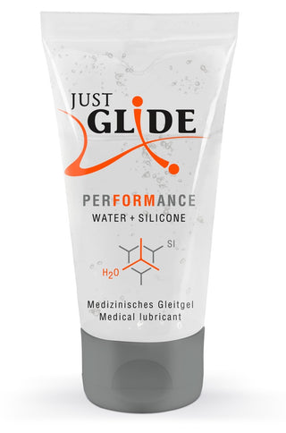 Tube of Just Glide Performance medicinskt vatten- och silikonsmörjmedel med en molekylär illustration och erbjuder hybridformel för långvarig jämnhet.