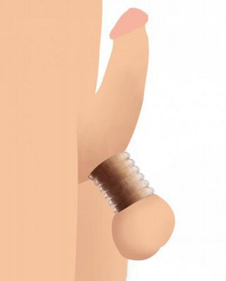 Illustrationen har en upp och nedvänd penis med en fjäder vid basen, som på ett smart sätt symboliserar behandling för erektil dysfunktion, och subtilt införlivar Ball Stretcher Kit i designen för förbättrad visuell berättelse.