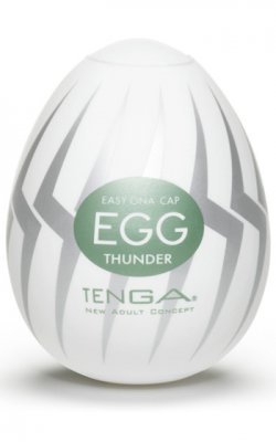 Masturbator - Tenga - Thunder är en diskret, vit äggformad produkt med ett elegant grått sicksackmönster designat för män.