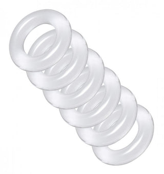 Ball Stretcher Kit har sex genomskinliga vita gummiringar, elegant arrangerade diagonalt på en orörd vit bakgrund, som påminner om en elegant penisringstapel.
