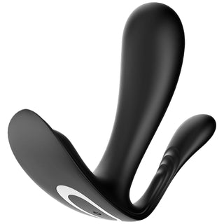 Närbild av Satisfyer Top Secret +, en svart ergonomisk prostata massageapparat med en elegant, böjd design och två stift. Den har en blank finish och cirkulära detaljer på basen, vilket framhäver dess moderna estetik.