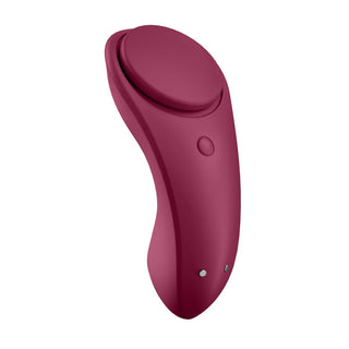 Den rödbruna Satisfyer Sexy Secret Trosvibratorn, en handhållen elektronisk enhet med en rund topp och sidoknappar, erbjuder sömlös kontroll och bekvämlighet.