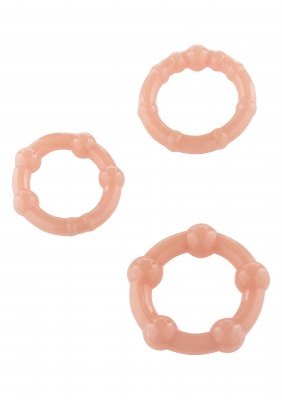 Stay Hard 3-Pack Penisring-setet har tre rosa silikonringar på en vit bakgrund, som var och en erbjuder olika storlekar för att förbättra uthålligheten och intensifiera erektioner.