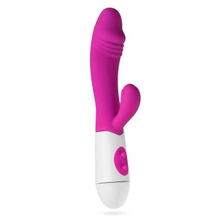 Realistic Rabbit Vibrator är en rosa och vit dubbelverkande enhet med klitorisstimulering och G-punkten-nöje, med två kontrollknappar på handtaget.