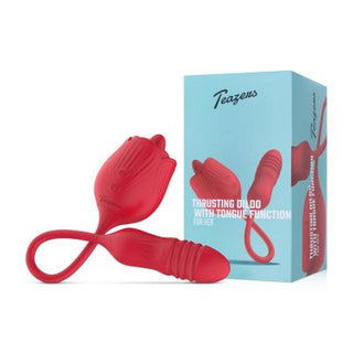 Teazers Rose Vibrator med Thrusting Dildo har en röd silikondesign med en tungfunktion och ett ögla handtag. Visad bredvid en blå "Teazens"-låda, ger den stötande och klitorisstimulering för ultimat tillfredsställelse.