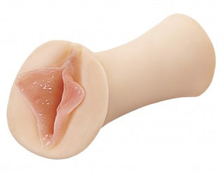 PDX-Extreme Self Lubricating Stroker är en köttfärgad onanihylsa för män gjord av Fanta Flesh-material, med en realistisk vaginadesign på en vit bakgrund.