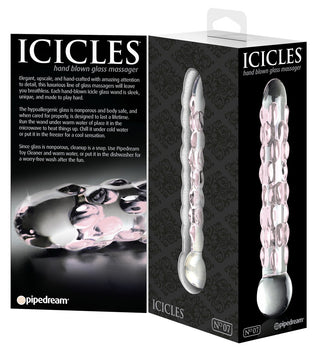 Dildo i klart glas med upphöjda prickar, genomskinligt material, böjd form och en rundad spets.
