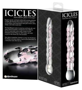 Dildo i klart glas med upphöjda prickar, genomskinligt material, böjd form och en rundad spets.