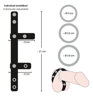 Läderrem med tre avtagbara kukringar i metall, svart färg. Designen innehåller mätmarkeringar.