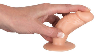 En liten, svart silikon You2Toys Anal Training Set dildo med en avsmalnande design visas mot en vit bakgrund.