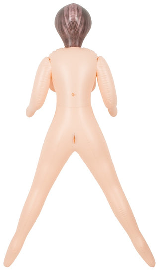 En Transdocka Med Dildo med utsträckta armar och ben ses bakifrån.