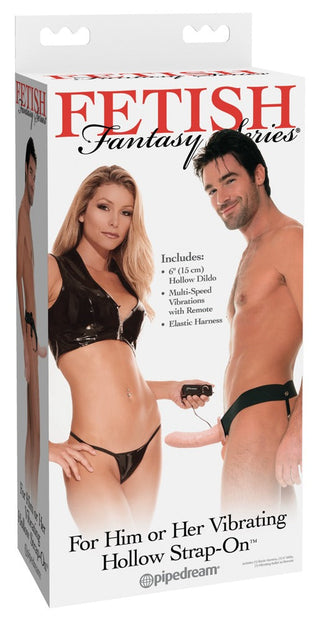En produktruta för Vibrating Hollow Strap-On, som visar en kvinna och en man i svarta underkläder och sele.