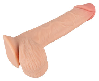Nature Skin Realistisk Dildo 18,7 cm: en realistisk silikonkopia av en mänsklig penis på vit bakgrund, perfekt för handsfree-nöje.