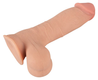 Nature Skin Realistisk Dildo 20 cm har intrikata detaljer och en kötttonad design för en autentisk upplevelse.