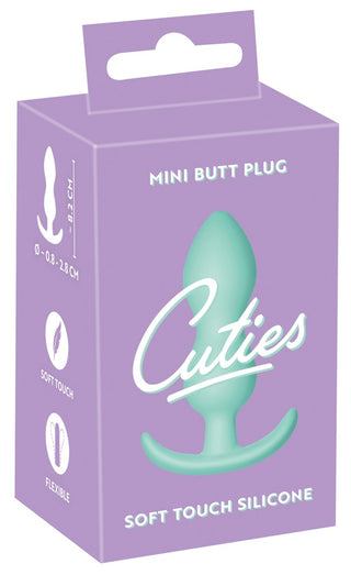 Boxen till Cuties Mini Buttplug Grön har en bild av den blågröna silikonpluggen, som framhäver dess kroppssäkert silikondesign.