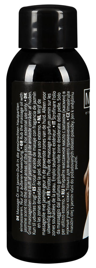 En svart flaska med flerspråkiga instruktioner antyder dess tjusning som en bärbar hudvårdsartikel, möjligen en exotisk godbit som Massageolja Jasmin 50 ml massageolja.