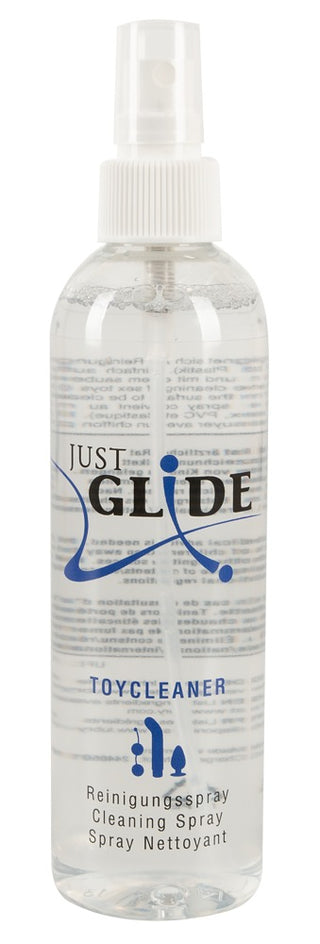 Just Glide Rengöringsspray 250ml: klar sprayflaska med munstycke, blå text. Alkoholbaserad formula för hudvänliga produkter-ideal som sexleksaker rengöringsspray.