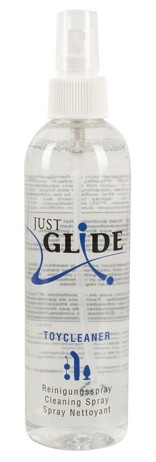 Just Glide Rengöringsspray 250ml: klar sprayflaska med munstycke, blå text. Alkoholbaserad formula för hudvänliga produkter-ideal som sexleksaker rengöringsspray.