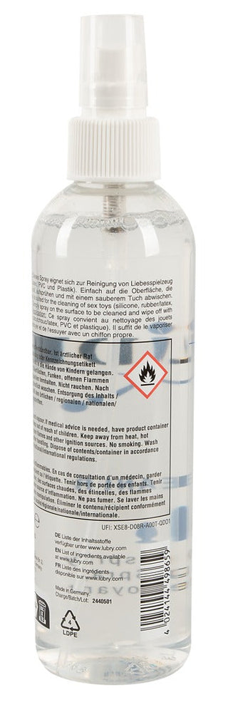 Just Glide Rengöringsspray 250ml levereras i en klar sprayflaska med en brandvarningsetikett och flerspråkiga instruktioner - perfekt för rengöring av hudvänliga produkter tack vare sin alkoholbaserade formula.