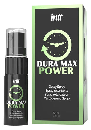 Svart flaska och låda märkta Dura Max Power Delay Spray 12ml, båda med en klockgrafik. Denna effektiva spray för män hjälper till att förlänga njutningen och ger pålitliga resultat när du behöver det som mest.