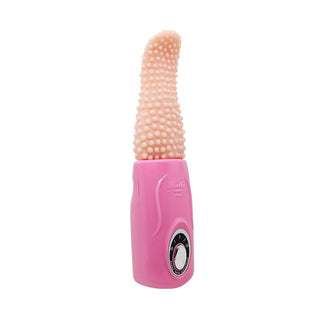 Rosa handhållen vibrator med texturerad silikonyta, flexibel beige spets och en kontrollratt på basen.