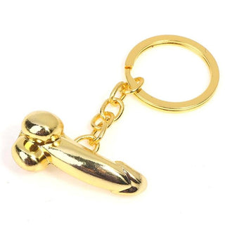 Upptäck det ultimata festtillbehöret med Guldig Dildo Nyckelring, en guldfärgad nyckelring med en guldig dildoform berlock elegant fäst på en cirkulär ring.