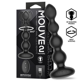 Svart analplugg i silikon med böjd design, vibrationsfunktion och fjärrkontroll, avbildad bredvid USB-laddaren och förpackningen.
