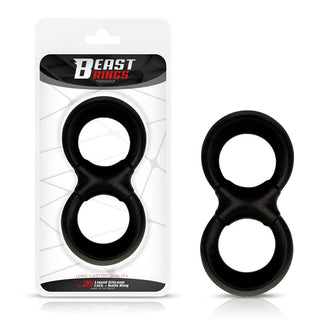 Transparent förpackning visar en svart dubbelögla ring bredvid den, märkt Beast Rings Dubbel Penisring 25 mm. Tillverkad av kroppssäker silikon, den eleganta, enkla designen säkerställer hållbarhet och är idealisk för personligt bruk.