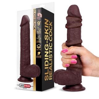 Slidy Dildo Dual Layer, 22 cm, hudfärgat silikon med realistiska detaljer, avbildad bredvid Sliding-Skin-förpackningen.