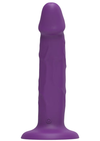 Get Real TOYJOY Vibrator 19 cm är en lila silikonleksak med realistisk form, flared sugpropp, selekompatibel och kan stå upprätt mot vit bakgrund.