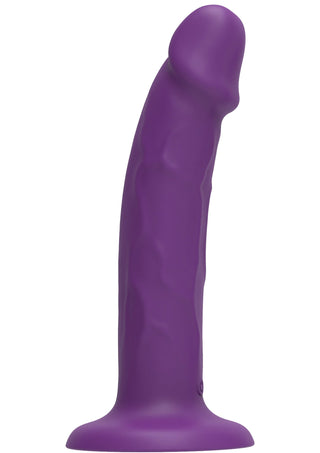 Get Real TOYJOY Vibrator 19 cm är en lila silikonleksak med en böjd, ådrad design som står upprätt på en platt, strap-on-kompatibel bas.