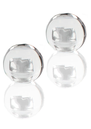 Two Glass Worxx Pärl-Knipkulor, som liknar delikat glaskulor, sitter mot en vit bakgrund. Placerade tätt med skimrande reflektioner under sig skapar de en spegeleffekt som framkallar en sensuell upplevelse.