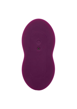 En lila, oval silikonfjärrkontroll av märket Vibepad med en knapp, sedd ovanifrån mot en vit bakgrund.