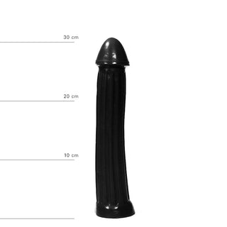 XXL Dildo 31,5 cm Svart, en svart ribbad cylindrisk leksak, står upprätt bredvid en höjdskala markerad i centimeter.