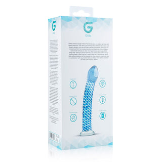 Genomskinlig glasdildo, 18 cm lång, slät design, avbildad i förpackning med minimal text och ikoner.