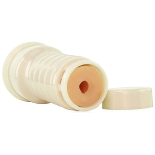 Fleshlight Eva Lovia Spice är en hudfärgad, cylindrisk vuxenleksak tillverkad av SuperSkin-material med ett avtagbart lock, som visas liggande på sidan.