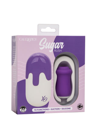 Lufttrycksvibrator i lila och vit silikon med slät design, visas i förpackning. Har 10 funktionsinställningar.