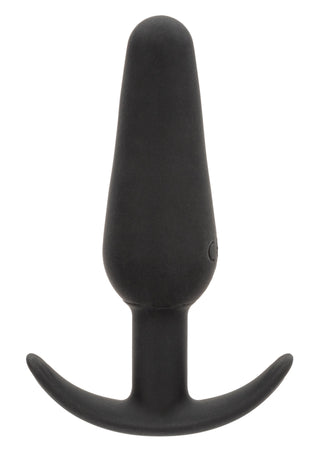 Boundless Vibrating Slim Plug, en vattentät analplugg i silikon med flared, böjd bas, står upprätt mot en vit bakgrund.