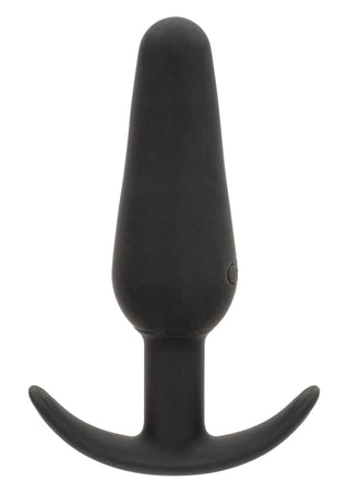 Boundless Vibrating Slim Plug, en vattentät analplugg i silikon med flared, böjd bas, står upprätt mot en vit bakgrund.