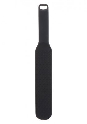 Hidden Desire Paddel, gjord av högkvalitativt silikon, visar upp en strukturerad yta och ett ergonomiskt handtag mot en vit bakgrund.