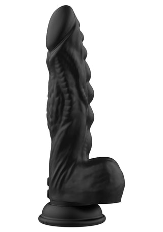 Svart dildo i silikon med struktur, vibrationsfunktion och sugkopp, avbildad mot en enfärgad vit bakgrund.