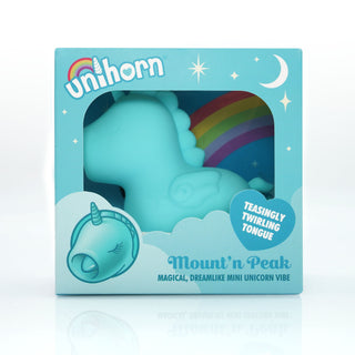 Unihorn Mount'n Peak Vibrator levereras i en låda med regnbåge, stjärnor och moln, och är perfekt för klitorisstimulering.