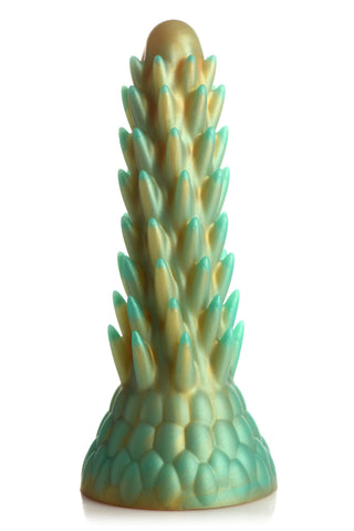 Stegosaurus Dildo Silikon är en texturerad silikondildo i blågrönt och guld, formad som en kotte med en bred bas och spetsiga spetsar.