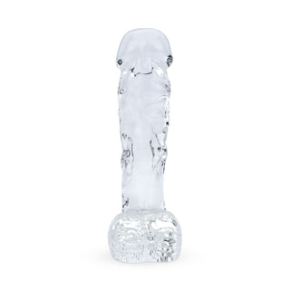 En realistisk, genomskinlig glasdildo från Gildo, 18 cm, som står upprätt mot en vit bakgrund.