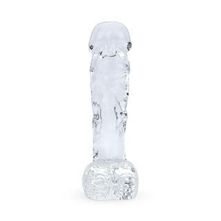 En realistisk, genomskinlig glasdildo från Gildo, 18 cm, som står upprätt mot en vit bakgrund.